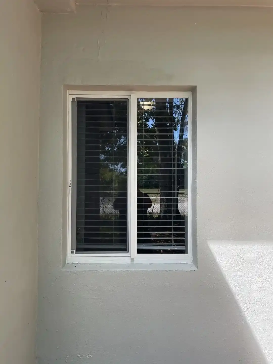 Impact French doors installed at the rear of a house