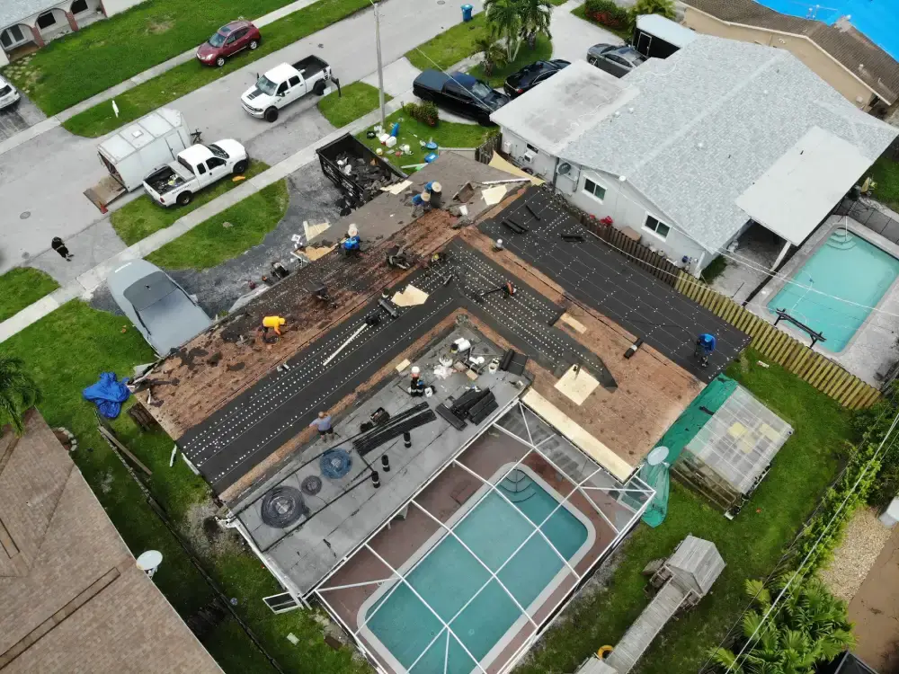 Finished roof and gutter system photographed from above after final inspection