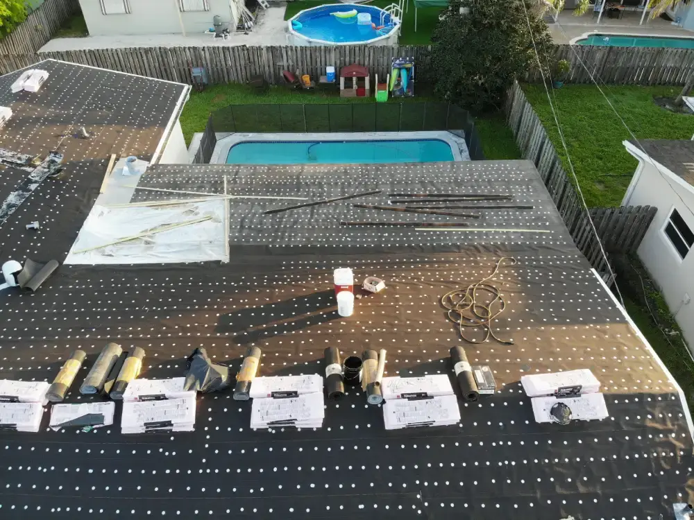 Aerial view of a Pembroke Pines, Florida neighborhood with a roof replacement in progress