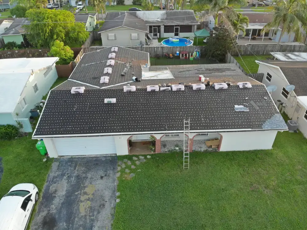 Drone view of a completed shingle roof replacement on a South Florida single-family home
